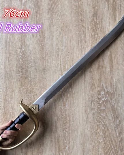 Grosser Piratensäbel 76cm aus PU-Gummi mit goldenem Kreuzschutz, dunkelgrauem Griff und silberner Klinge