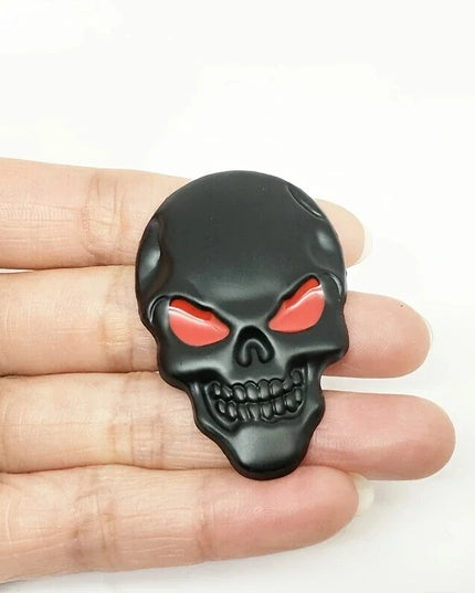 Totenkopf Aufkleber Schwarz mit roten Augen Detailansicht